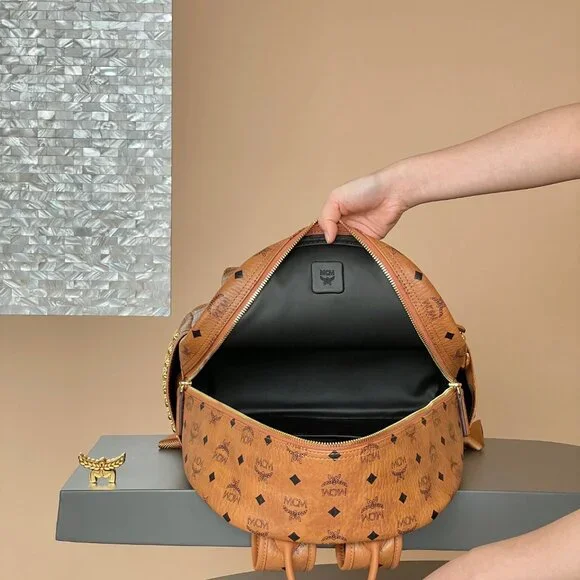 MCM Tan Leather Backpack/purse with Gold Accents - Picture 4 of 9